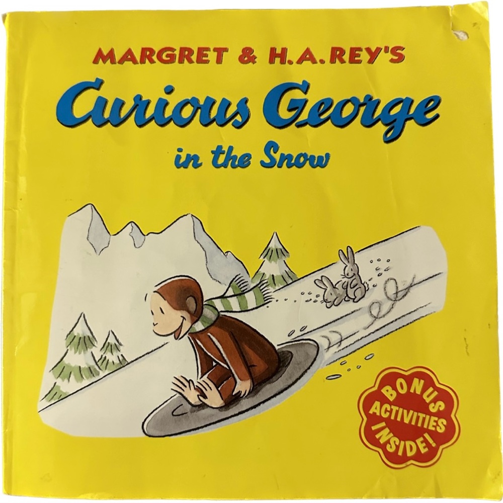 Curious George in the Snow paperback book
